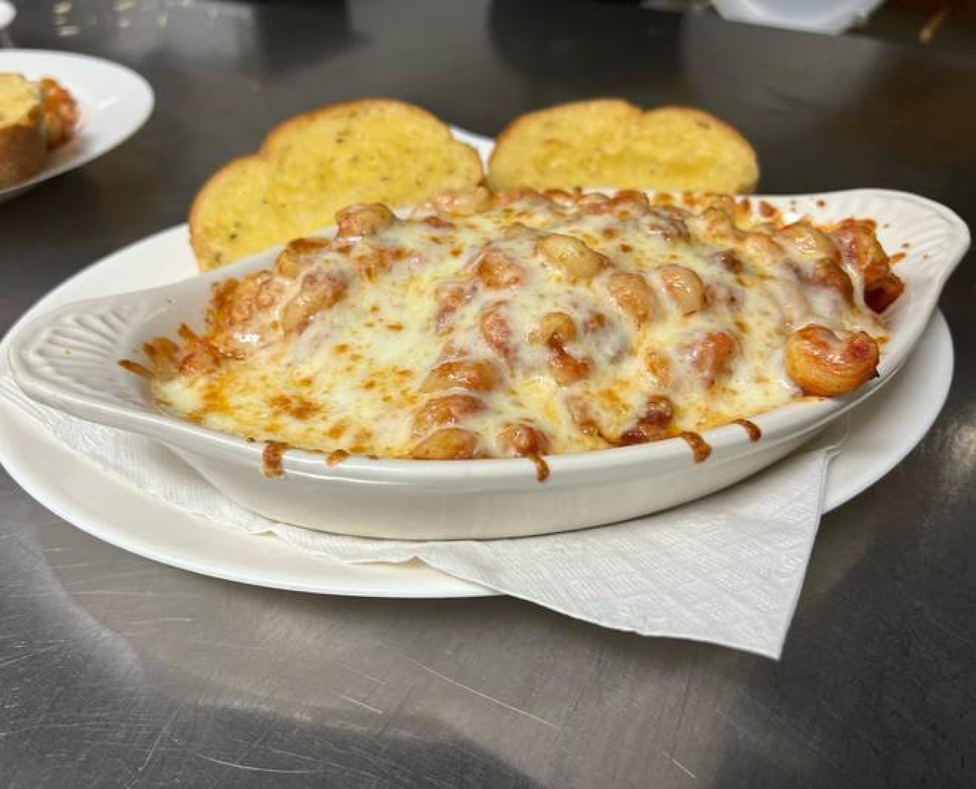 Pasta covered in marinara and cheese from Pagliai's.